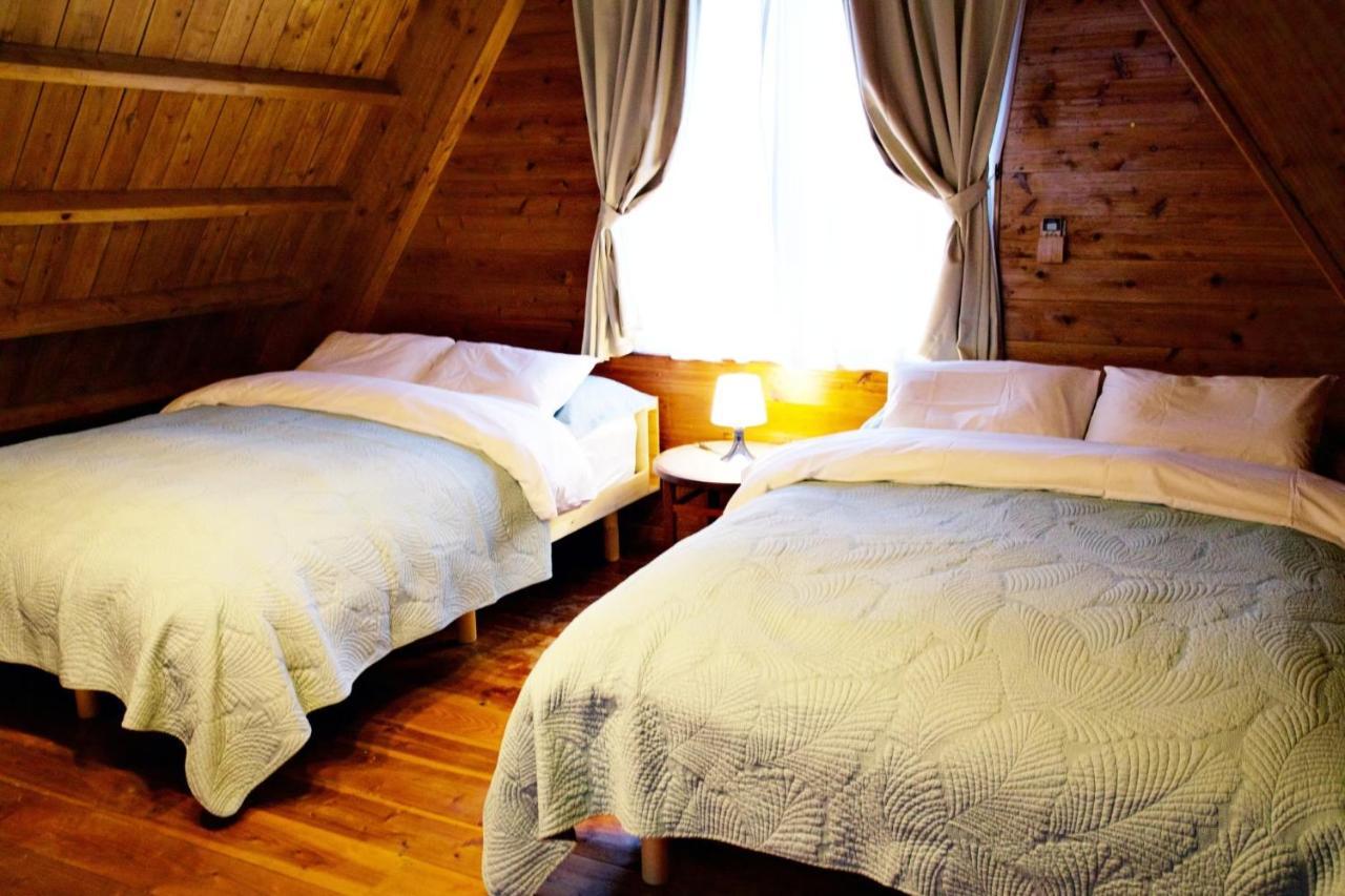 Appartement にらい恩納　杉の木 à Onna Extérieur photo