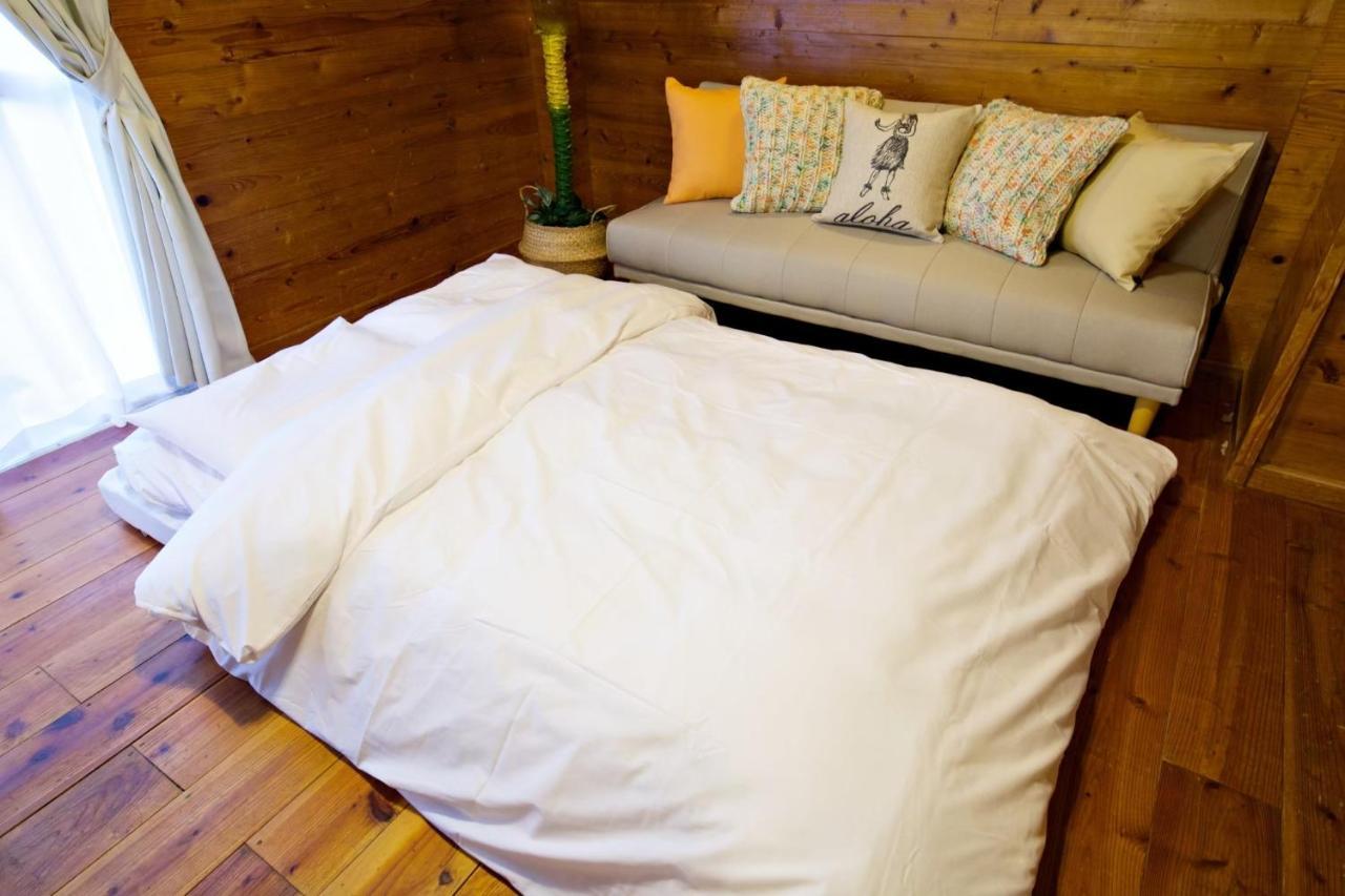 Appartement にらい恩納　杉の木 à Onna Extérieur photo