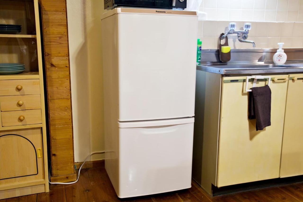 Appartement にらい恩納　杉の木 à Onna Extérieur photo